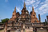 Thailand, Old Sukhothai - Wat Mahathat, the main chedi is composed by a platform with a chedi in the centre, with the characteristic shape of a lotus bud, surrounded by eight smaller chedi at the cardinal points.  